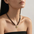 Hawk’s Eye & Sandalwood Necklace